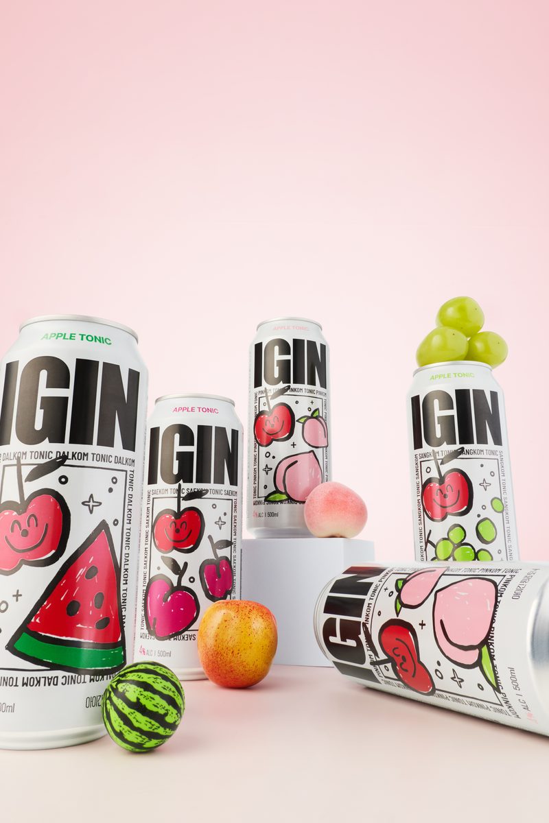 All four Apple Tonic flavors on pink with fruit