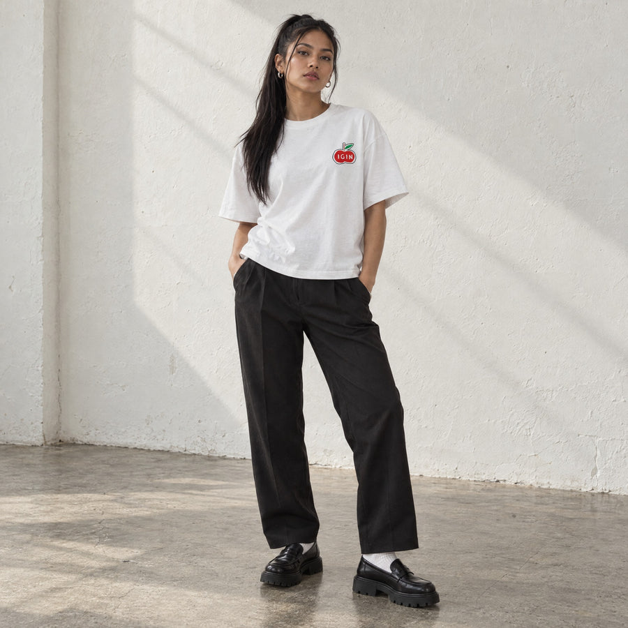 Model wearing the Appuri Heart Box Tee, front view, in a sunlit studio