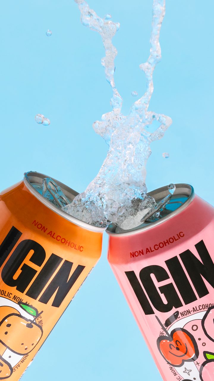 Apple Citrus and Apple Peach cans clinking with a splash
